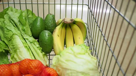 shopping cart filled with fresh produce