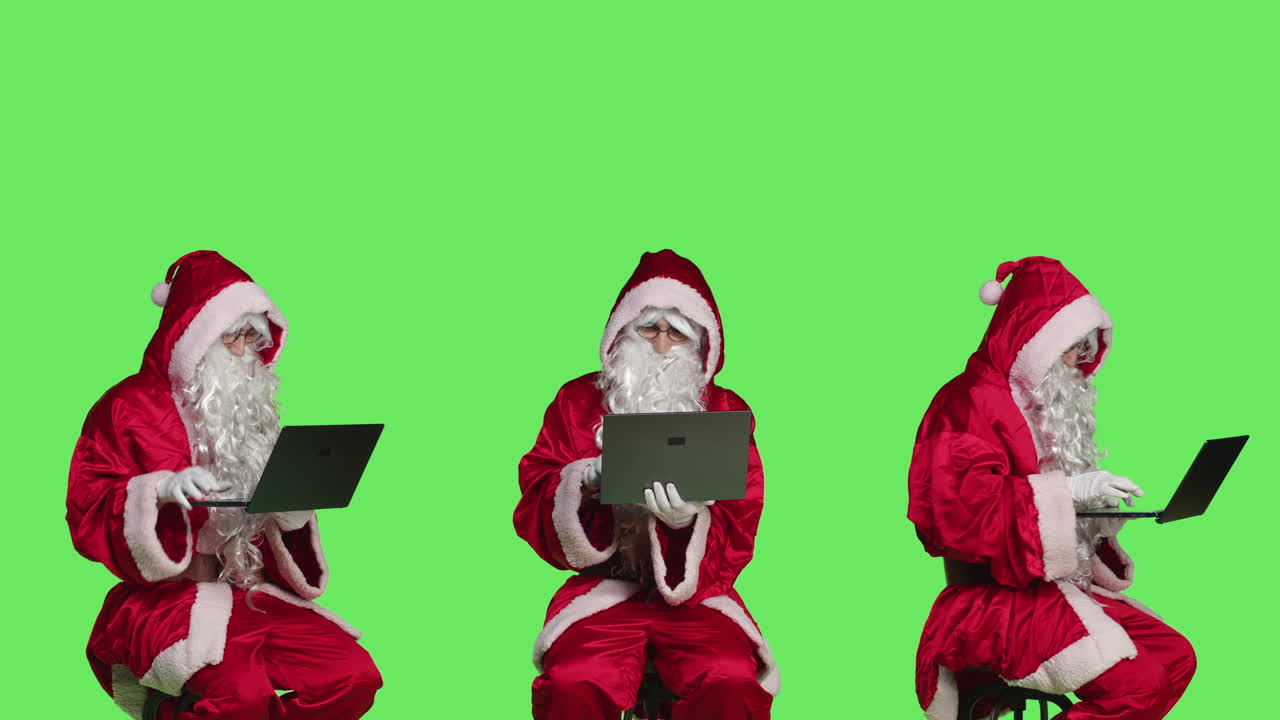 Santa Claus Using Laptop on Green Screen