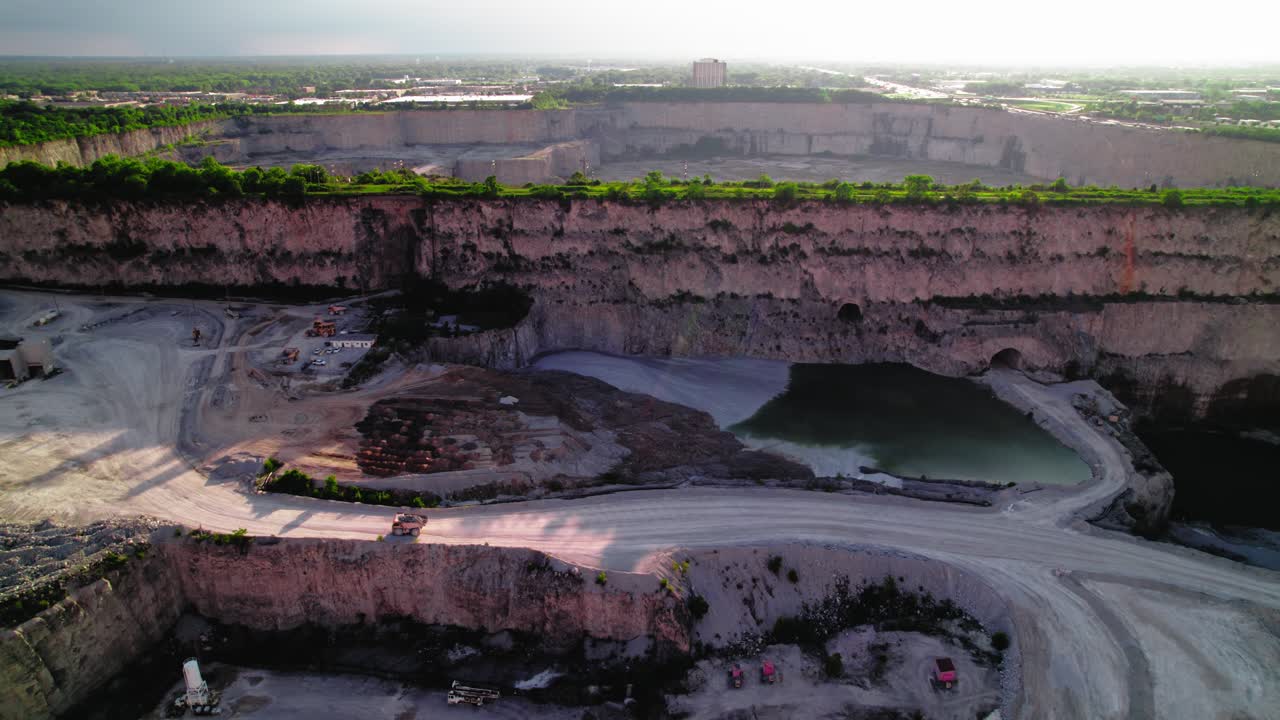 Heavy Duty Dump Truck Thornton Illinois Quarry: Massive Limestone Excavation Site Reveals Geological Layers and Mining Operations