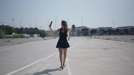 woman taking a selfie outdoors