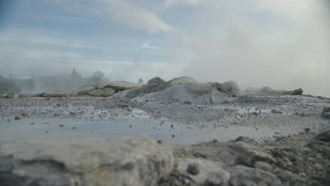 Rotorua-steamy-geothermal-geyser,-New-Zealand,-Slow-motion-wide-shot