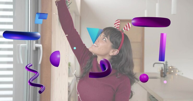 Woman grabbing string lights by window and looping strands onto accent wall for interior design