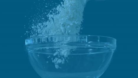 animation of abstract pattern over white powder falling in bowl against blue background