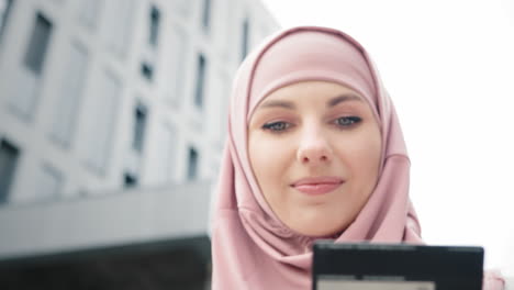 woman using mobile phone and credit card