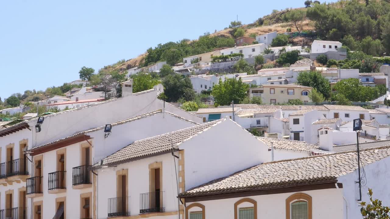 View of rooftops and white houses on the hillside of Montefrío, Granada. Traditional Andalusian architecture