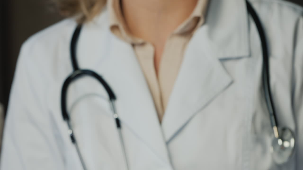 Doctor In Gloves Shows Pills And Jar