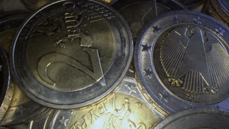 macro from extreme close up of a pile with many two euro coins