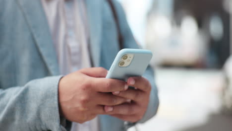 Business-person,-hands-and-phone-in-city