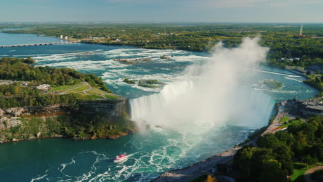 boat by niagara horseshoe waterfalls