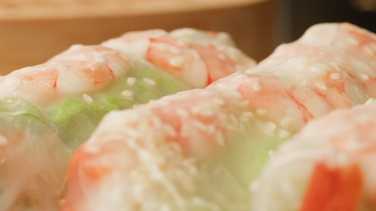 Close-up of Fresh Shrimp Spring Rolls with Sesame Seeds