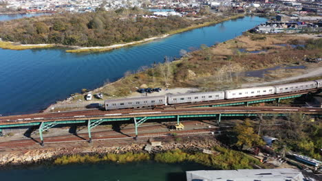 an aerial shot over grassy bay in queens, ny