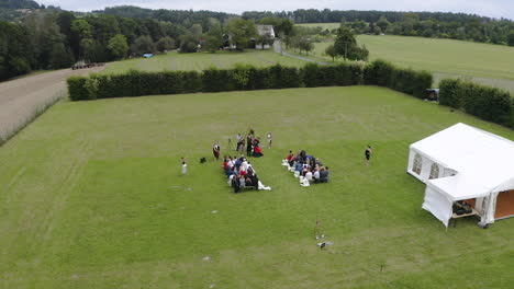 outdoor wedding ceremony in a grassy countryside park,summmer,czechia