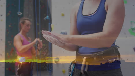 Animation-of-landscape-over-caucasian-women-climbing-wall