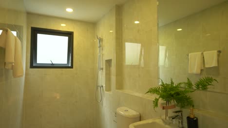 modern and simple white tiles bathroom interior design, no people