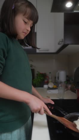 girl cooking in the kitchen