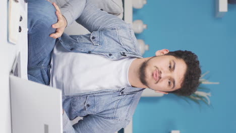 Vertical-video-of-Stressed-man.