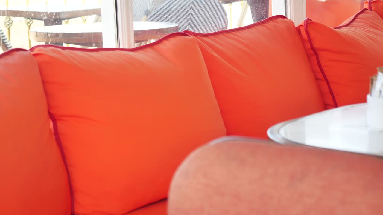 Orange Cushioned Seating Area