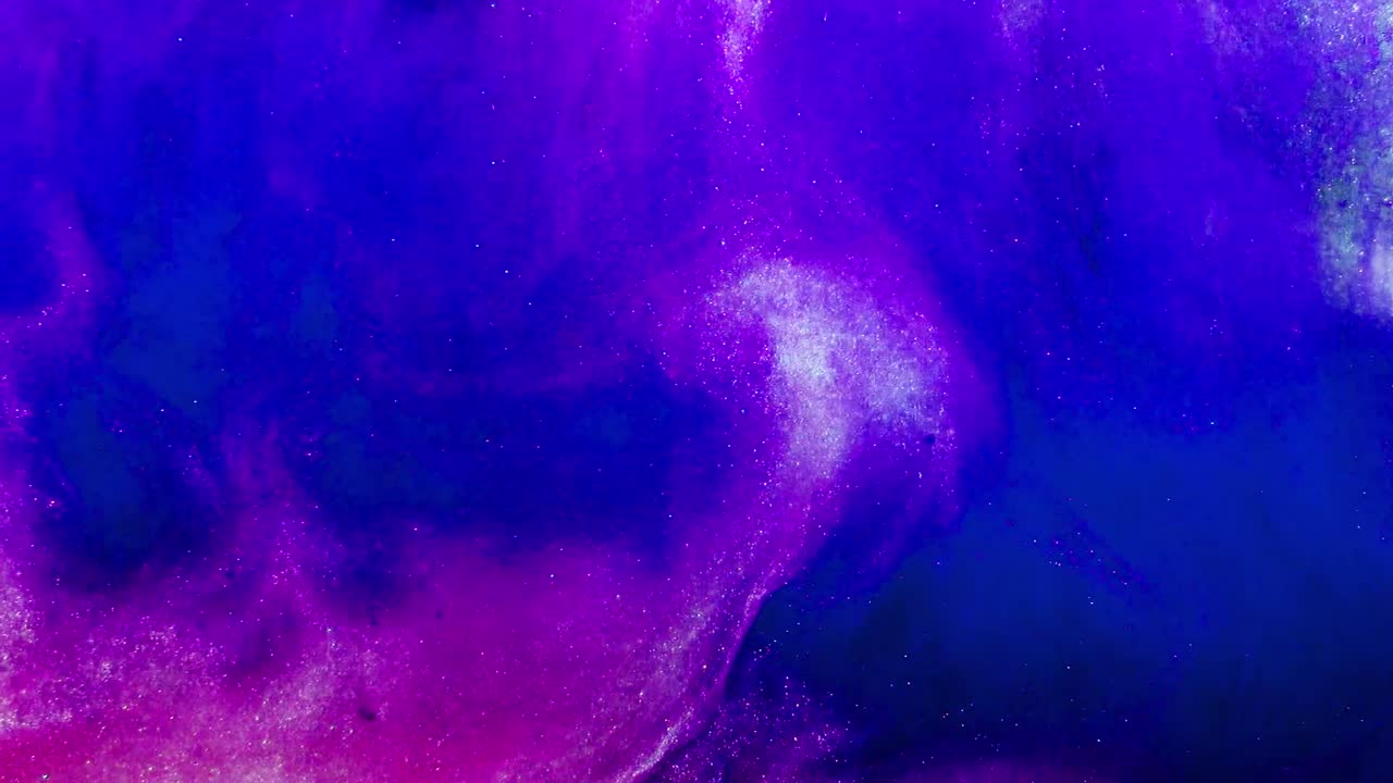 Forme astratte. Riprese su sfondo nero. Mescolanza di colori