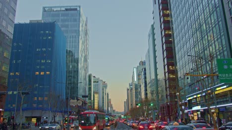 wide cityscape view big town in south korea, seoul, gangnam traffic with cars, buses, skyscrapers and big urban architecture