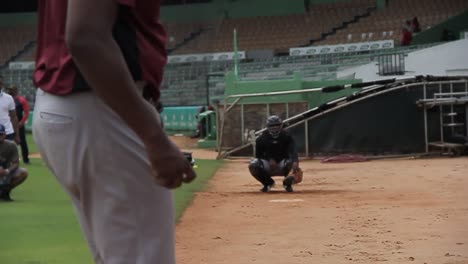 san pedro de macoris, dr - march 12 2021 - baseball player training pitching at the stadium, team training season