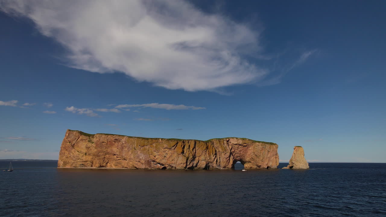 Low aerial approach of Rock Perc&eacute; Gasp&eacute;sie Qu&eacute;bec Canada