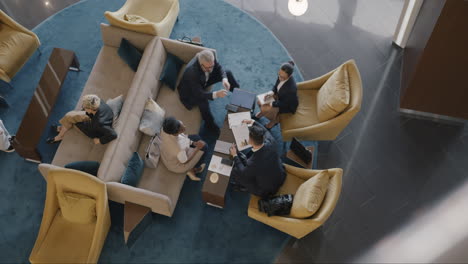 business meeting in a modern hotel lobby