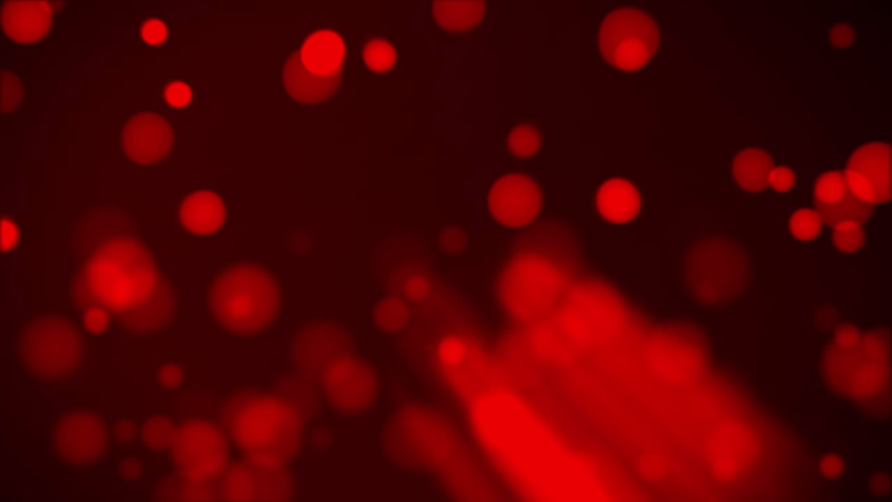 animación de bokeh rojo con rayos y partículas borrosas fluctuantes