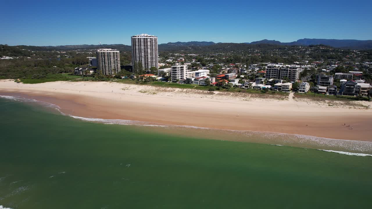 Beachfront Hotels At Palm Beach In Gold Coast, QLD, Australia. - aerial shot