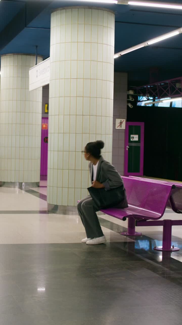 Woman at a Subway Station