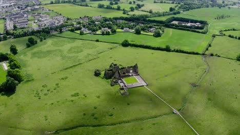 overhead view of an irish castle in the countryside.