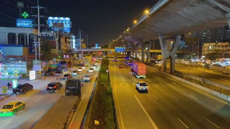 vehicles moving on a busy highway at night