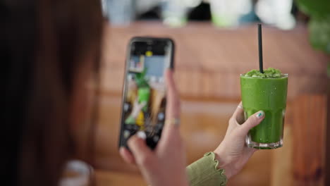 Phone-screen,-photography-and-green-juice