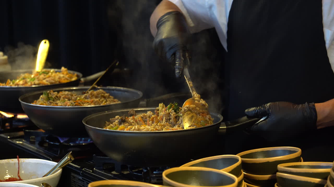 Steaming and flavorful rice wok with vegetables and meat
