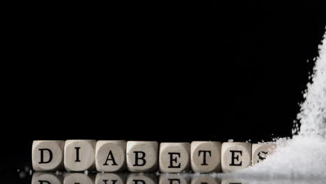 sugar pouring and covering dice spelling diabetes