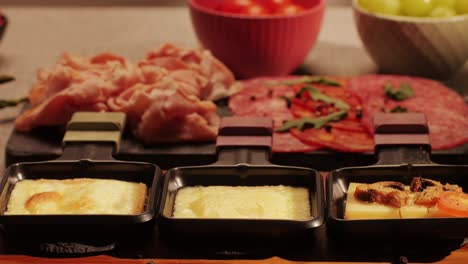 italian or spanish restaurant with traditional tapas food, spanish cuisine, delicious tapas and cheese plate, bruschetta with cheese, olives dry tomatoes and tasty sandwich bar appetizer, buffet
