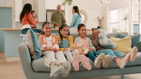 Friends,-living-room-and-children-on-sofa-watching