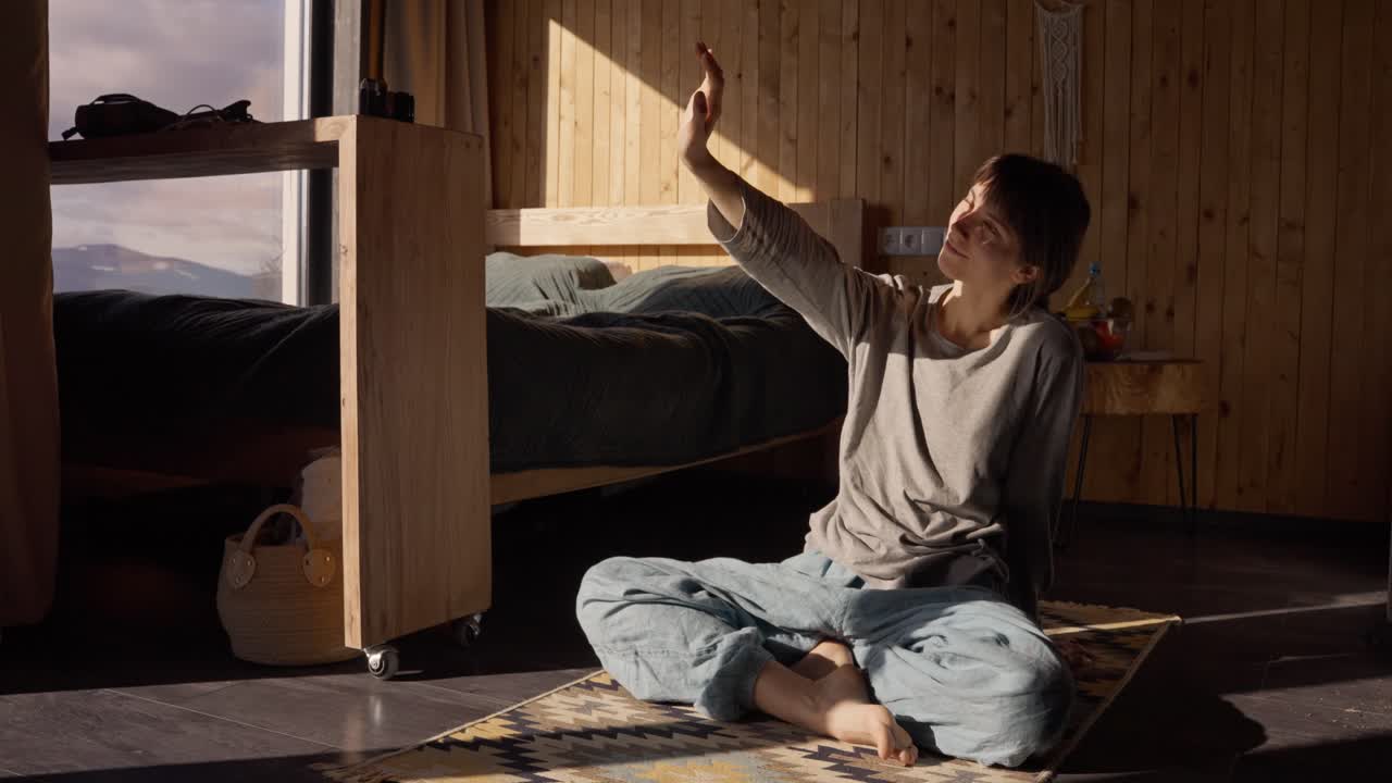 Woman in bedroom in the morning