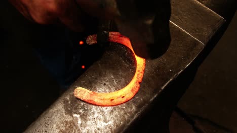 Blacksmith-working-on-a-horseshoe