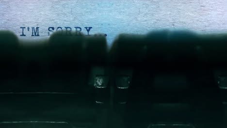 typed 'i'm sorry' message on vintage typewriter