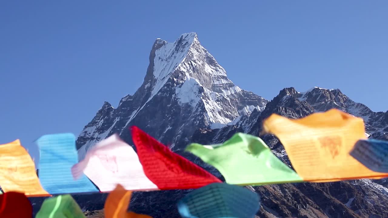 Shining Mount Fishtail and prayer flag at Pokhara, Nepal