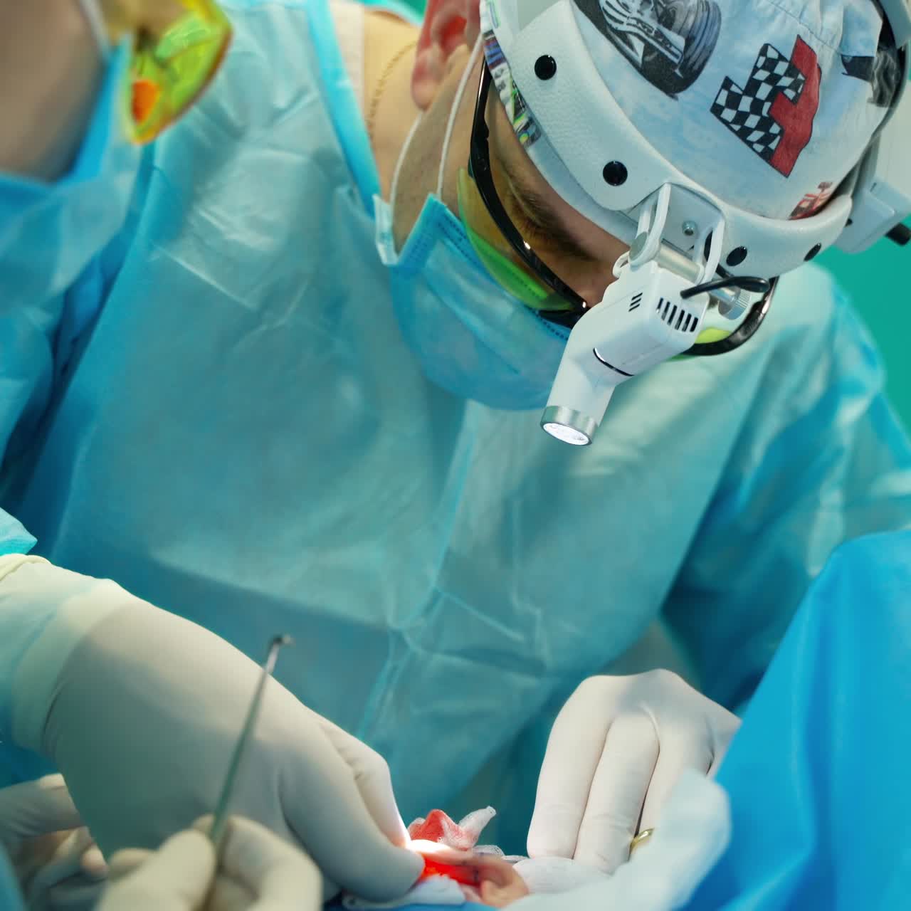 Surgery team working together in room. Team of surgeon at work in operating room