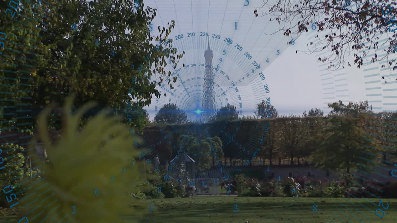 Digital data overlay animation over park view with distant tower in background