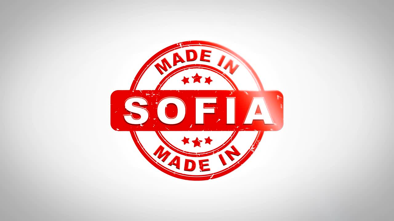 Made In SOFIA Signed Stamping Text Wooden Stamp Animation. Red Ink on Clean White Paper Surface Background with Green matte Background Included.