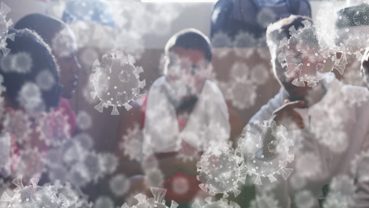 변기실에서 남성 축구 선수들의 다양한 그룹 위에 떠다니는 바이러스 세포의 애니메이션