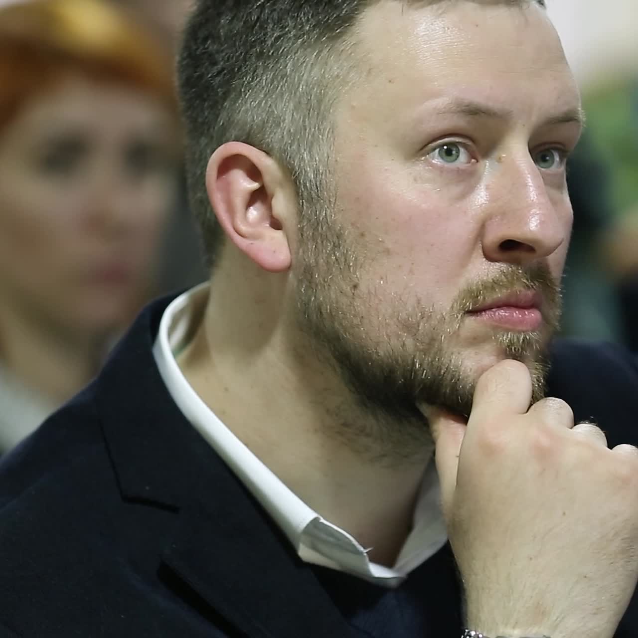 Conference hall full of people participating in the business training