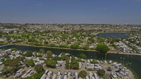 san diego california aerial v81 flyover campland on the bay across rose inlet towards de anza cove, caravan camping park bayfront sites with rvs in summer - shot with mavic 3 cine - september 2022