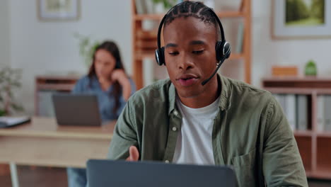 black man, call center and laptop with headset
