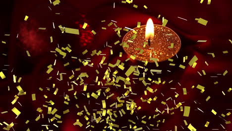 animación de confeti de oro que cae sobre una vela roja encendida