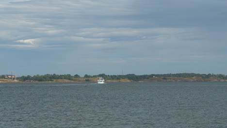 Time-lapse-of-two-tourism-boats-sailing-in,-out-of-Helsinki-harbour