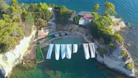 cameo island in greece with beach and white sheets flying in the sky